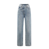 Jean avec ceinture croisée