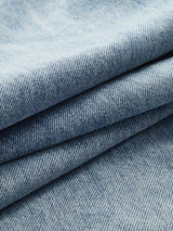 Denim broek lichtblauw detail textuur