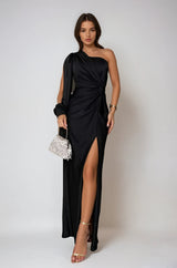 Elegant jurk zwart met split en knoopdetail, front view