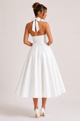 Elegantní midi šaty s halter výstřihem a širokou sukní