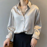 Dames blouse wit zijden stof lange mouwen vooraanzicht