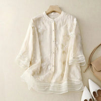 Blusa da donna con ricamo floreale e vestibilità ampia