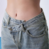 Jean avec ceinture croisée