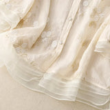 Blusa da donna con ricamo floreale e vestibilità ampia