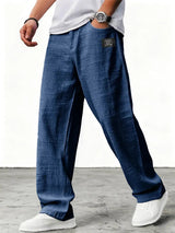 Lněné kalhoty s širokými nohavicemi