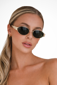 Lunettes de soleil ovales pour femmes avec monture en métal