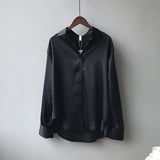 Dames blouse zwart zijde met contrastkraag front view