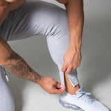 Joggeurs ajustés rayés pour hommes