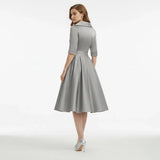 Rochie midi retro cu decolteu în V și fustă amplă