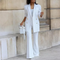 Blazer elegante con chiusura a bottoni e pantaloni svasati da donna - Completo due pezzi per tutte le stagioni