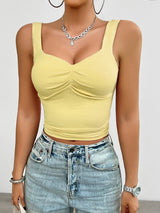Slim fit tanktop geel met twistdetail vooraanzicht